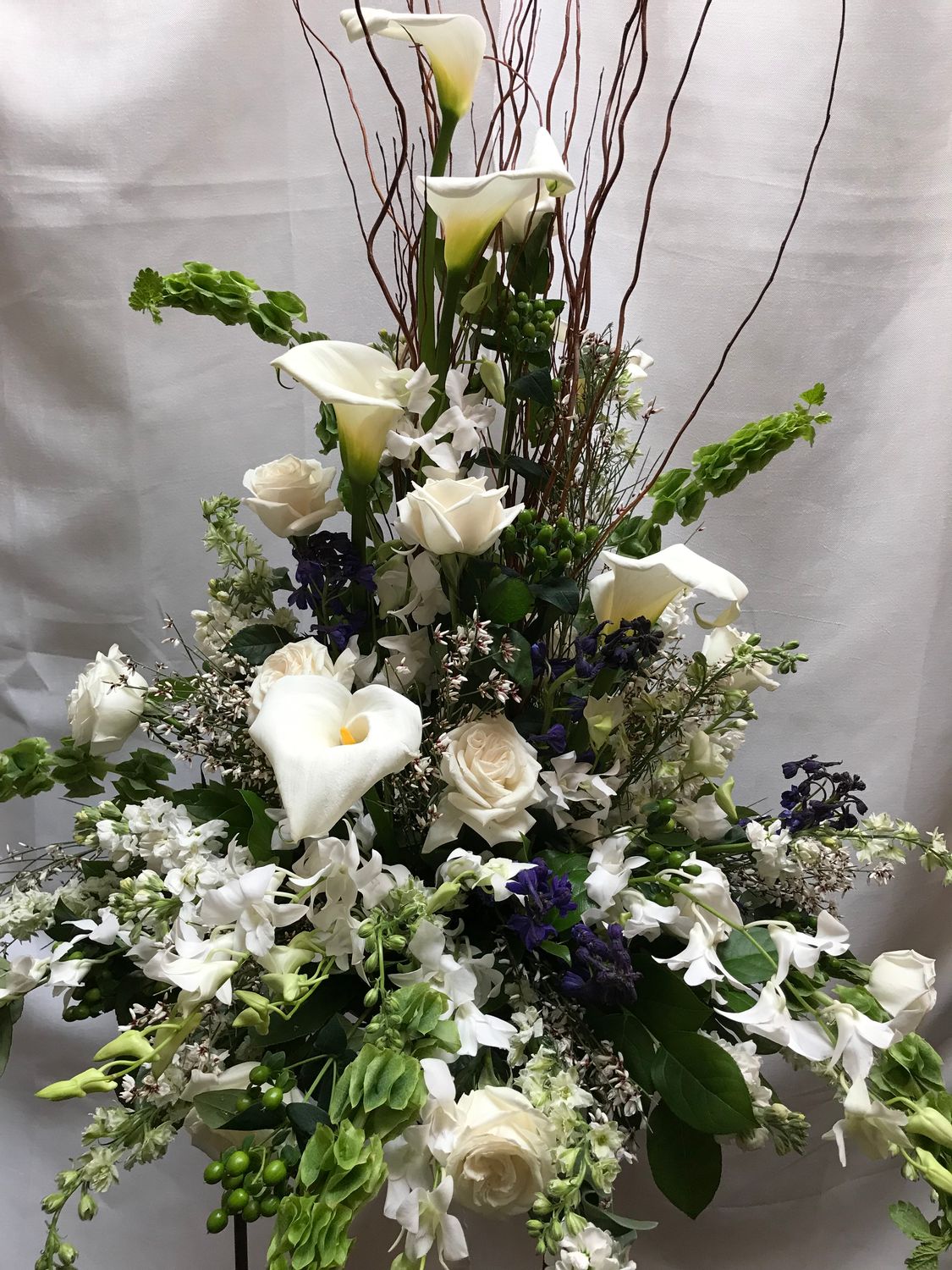 A Touch of Blue Traditional Urn by Twigs Floral Design