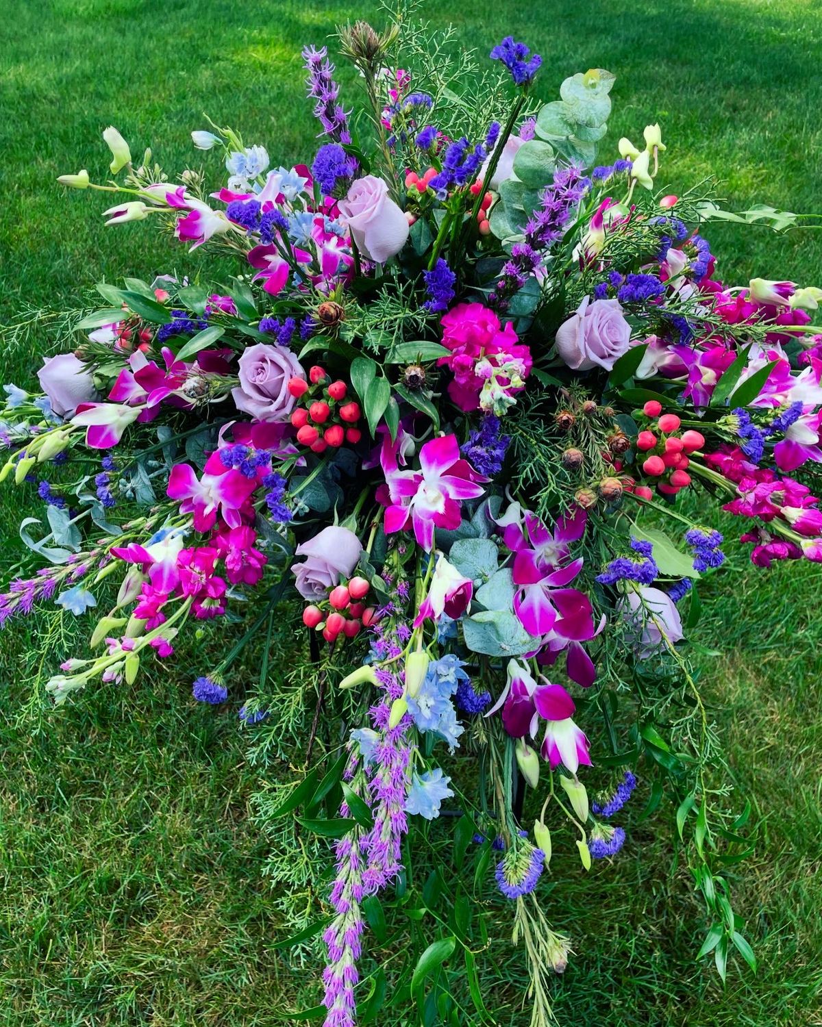 Love&#39;s Grace Casket Spray by Twigs Floral Design