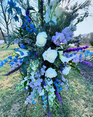 Purple and Blue Easel Spray by Twigs Floral Design