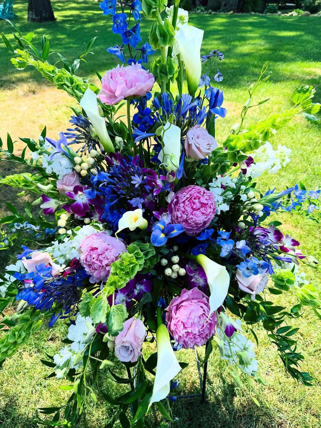 Bold Garden Traditional Urn by Twigs Floral Design