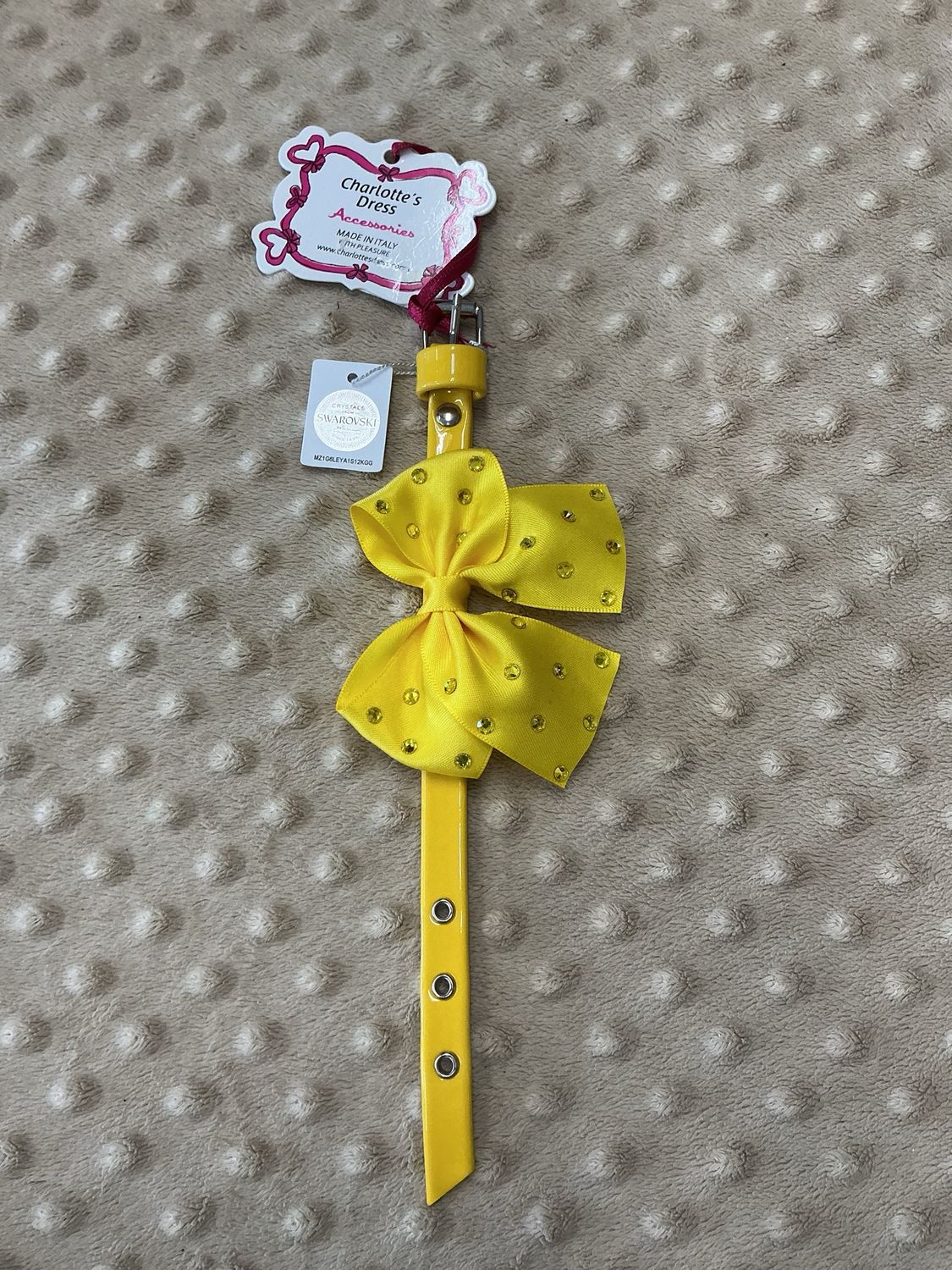 Halsband geel 20cm met *