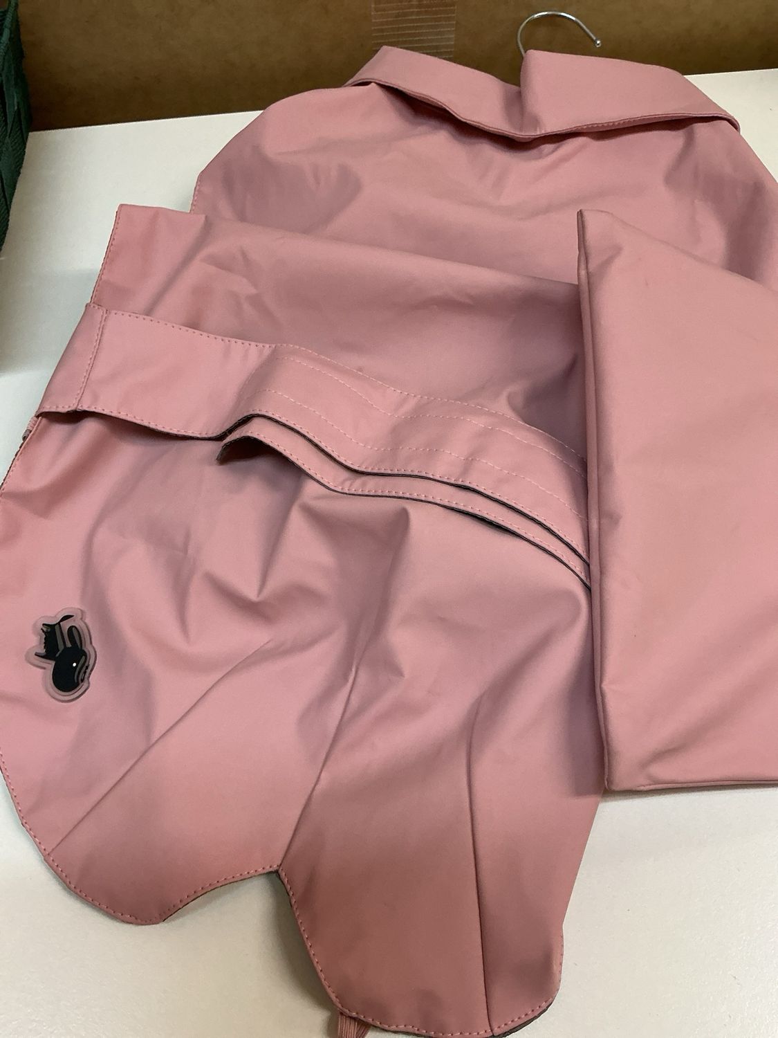 Regenjas roze met opbergzakje maat 50 cm