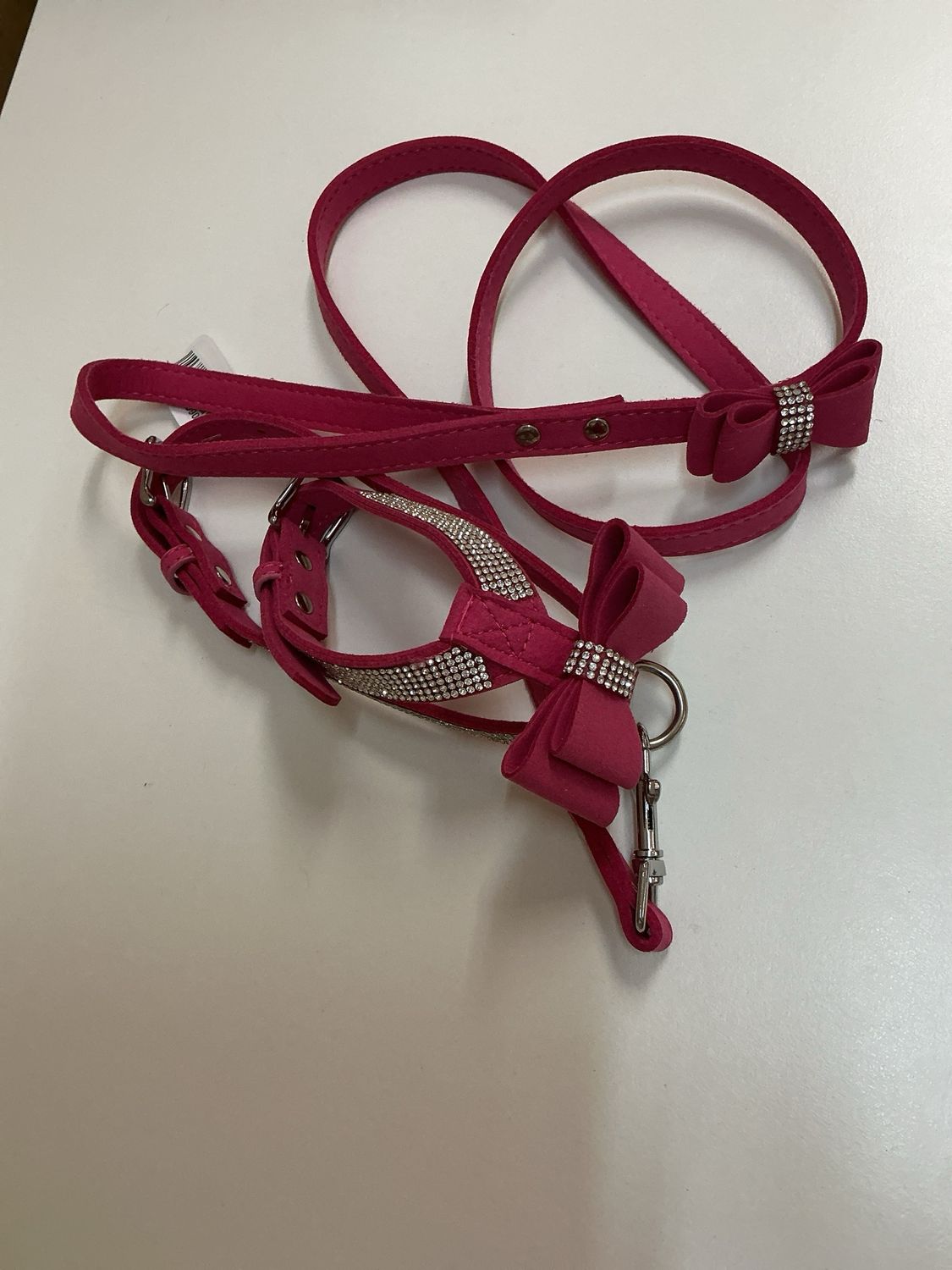 Halsband en leiband roze met strikjes en steentjes maat 40 cm