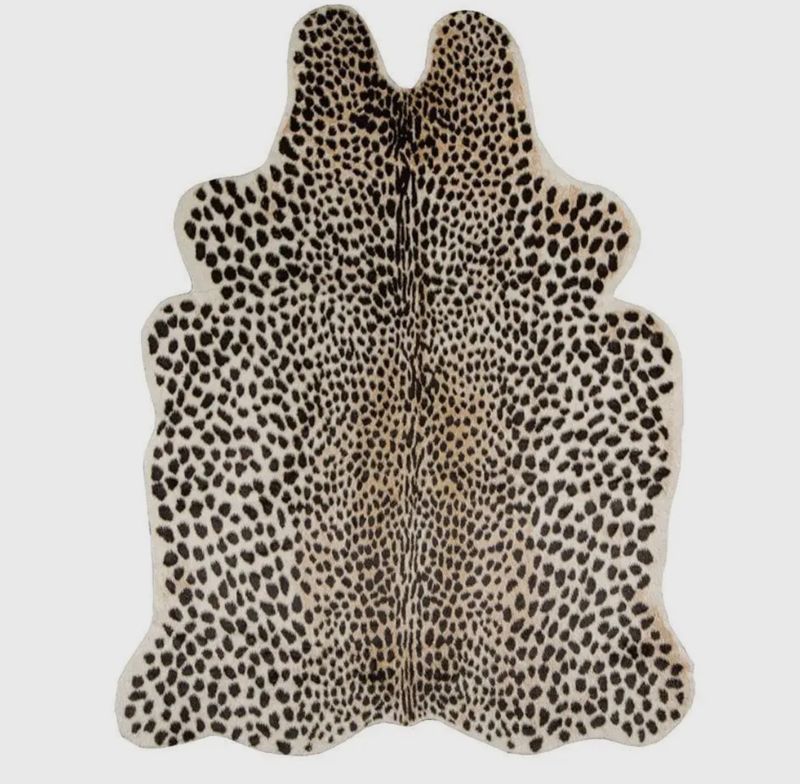 Leopard cowhide rug