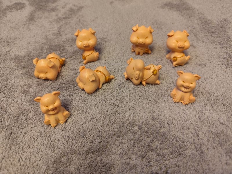 Dekorative Schweinchen Figuren