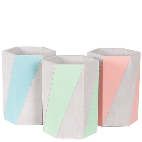 40% off was $10 now $6. 8"H X 4.75" HEXAGON CEMENT CORAL STRIPES