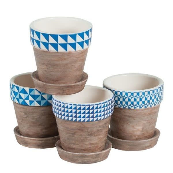 40% off was $5 now $3. 3"H X 2.75" ROUND GEOMETRIC BLUE W/SAUCER ASSORTED STYLES IN A BOX, PACKED 24