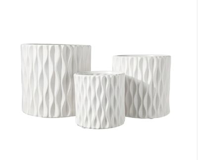 6.75”H X 7” LARGE WHITE CERAMIC CYLINDER WITH WAVE DESIGN PATTERN