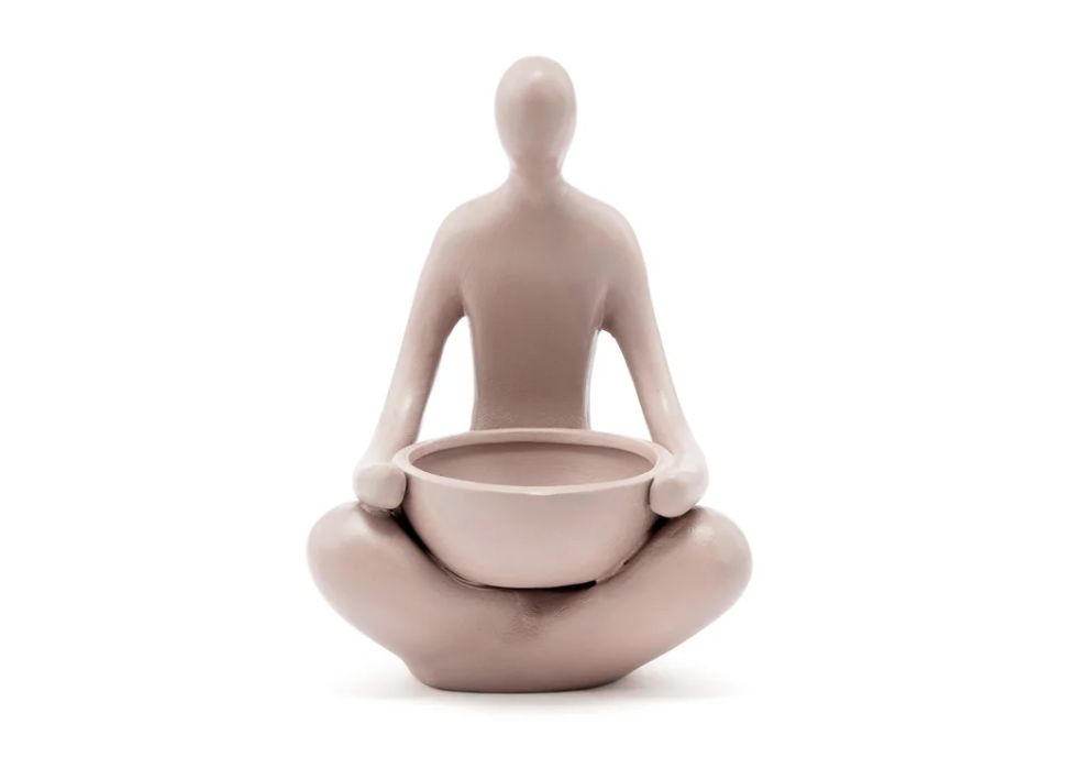 50% off was $14 now $7. 6.5"h, pot 1.25"h x 2.5" FACELESS PLANTER