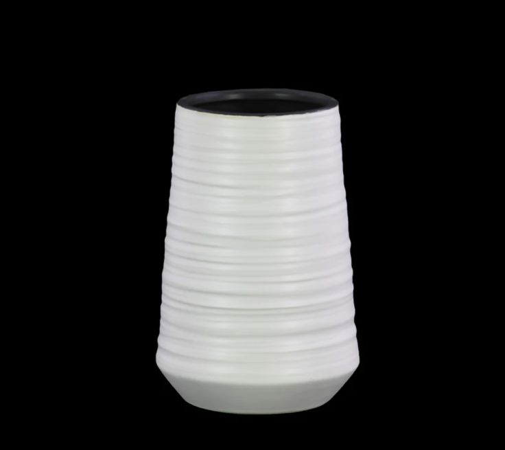 50% off was $29 now $14.50. 8.5”H X 5.75” WHITE CERAMIC COMBED VASED
