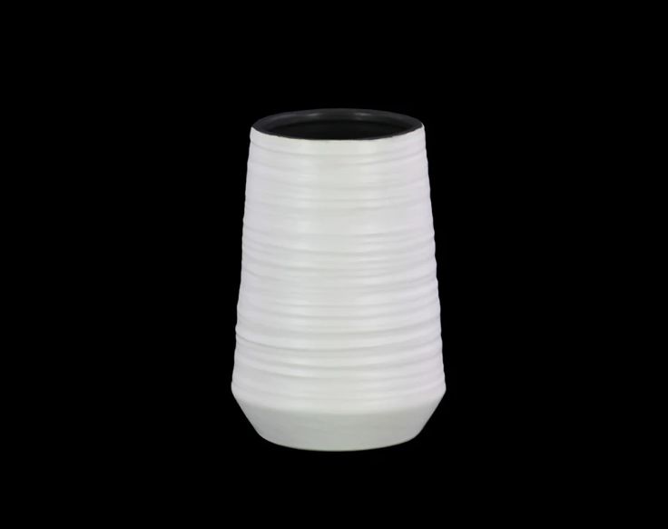 50% off was $23 now $11.50. 7.5”H X 5” WHITE CERAMIC COMBED VASED