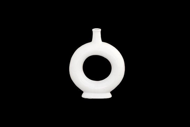 50% off was $19 now $9.50. 8”H X 6.5” MATTE WHITE CERAMIC RING PEDESTAL VASE