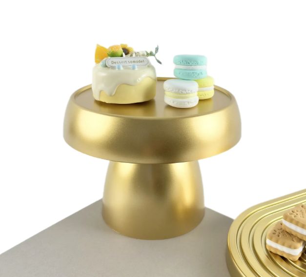 7.25”H X 5.5” GOLD MUSHROOM PLASTIC CAKE AND CUPCAKE STAND. nd reg $7.99
