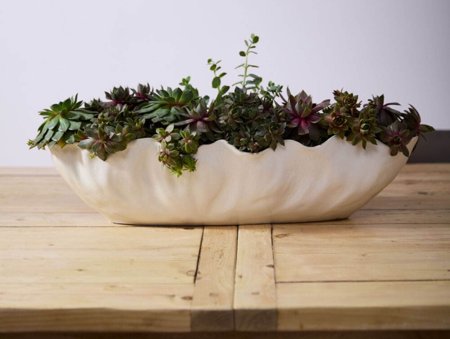 5.5”H X 7.75” X 23.25” OFF-WHITE CERAMIC COASTLINE TROUGH BOAT VASE