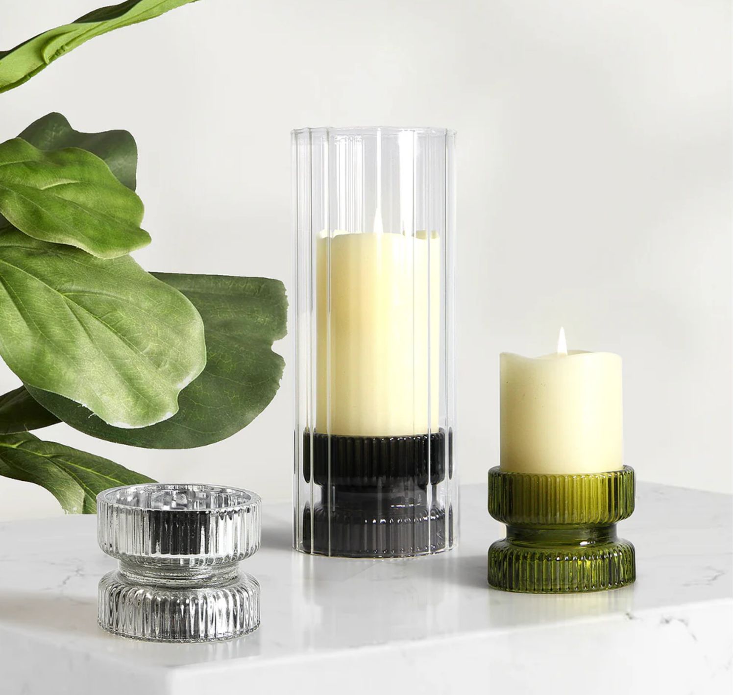 2.75"H X 3.5"GLASS FLUTED SILICA PILLAR CANDLE HOLDER