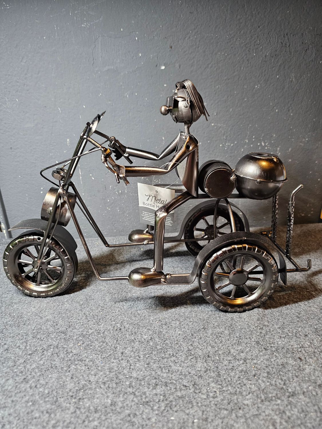 Stojak na butelkę motocyklista