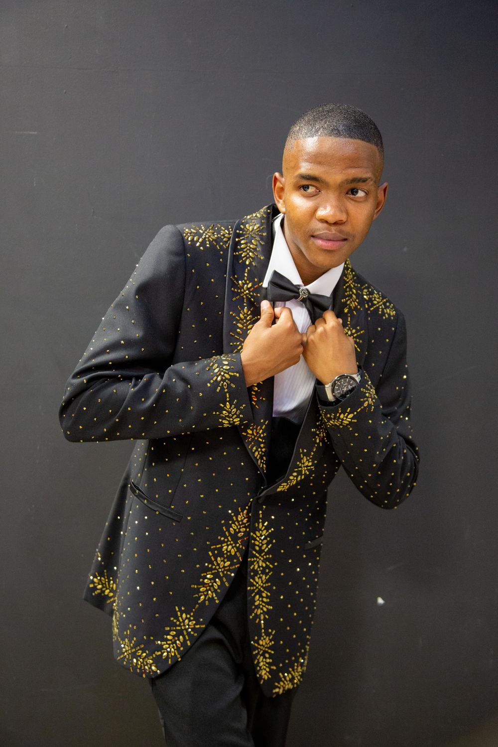 BLACK SUIT WITH GOLD RHINO STONES – AUCKLEY M BOUTIQUE