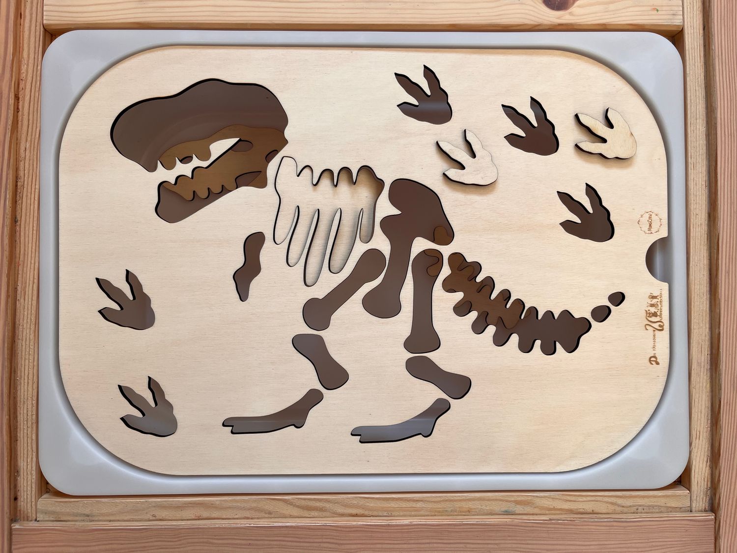 Aktivitätsplatte Dinosaurierskelett mit Puzzleteile