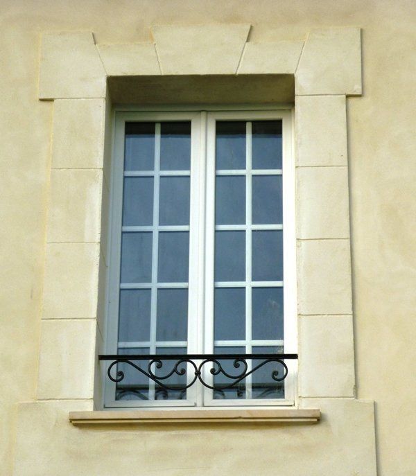 Appui de fenêtre Appui de fenêtre "volute double" en fer forgé