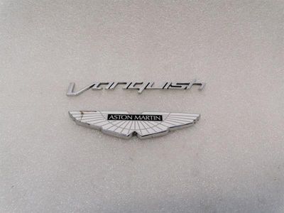 ASTON MARTIN VANQUISH AM310 CD33-407A74-BB REAR LOGOS BADGE ASSEMBLY WINGS