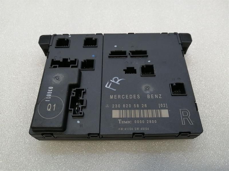 Mercedes SL R230 right door module A2308205826 door control unit right front
