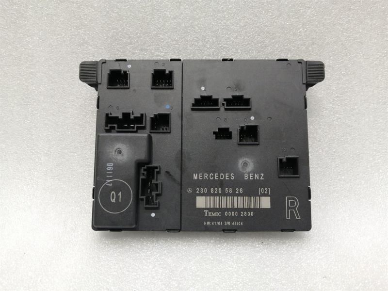Mercedes SL R230 right door module A2308205826 door control unit right front