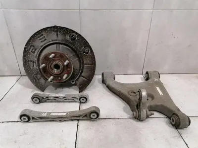 Tesla Model S 75 Left Rear Hub 1042506-00-B Wheel Bearing Housing Rear Left