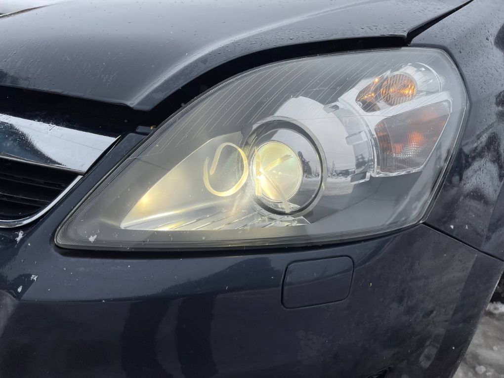 Headlight left OPEL ZAFIRA B (A05) (2005-2014)