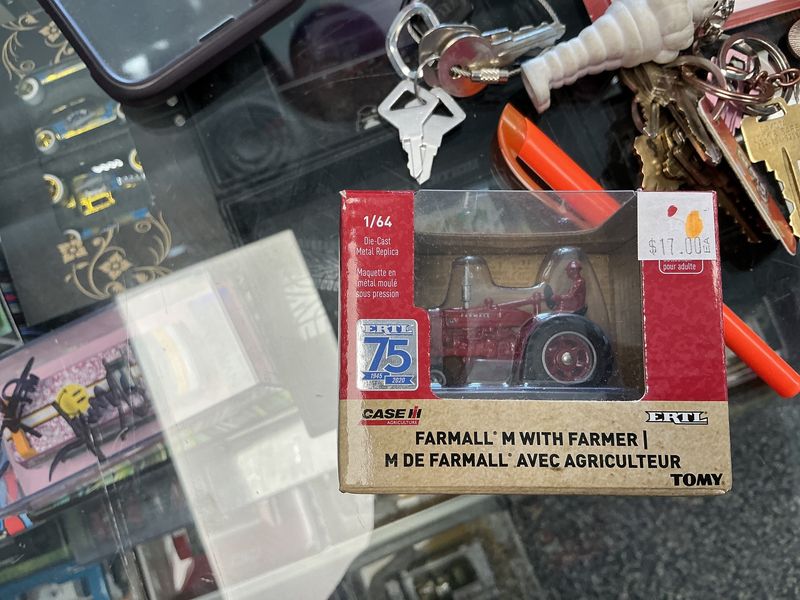 Farmall m with farmer
