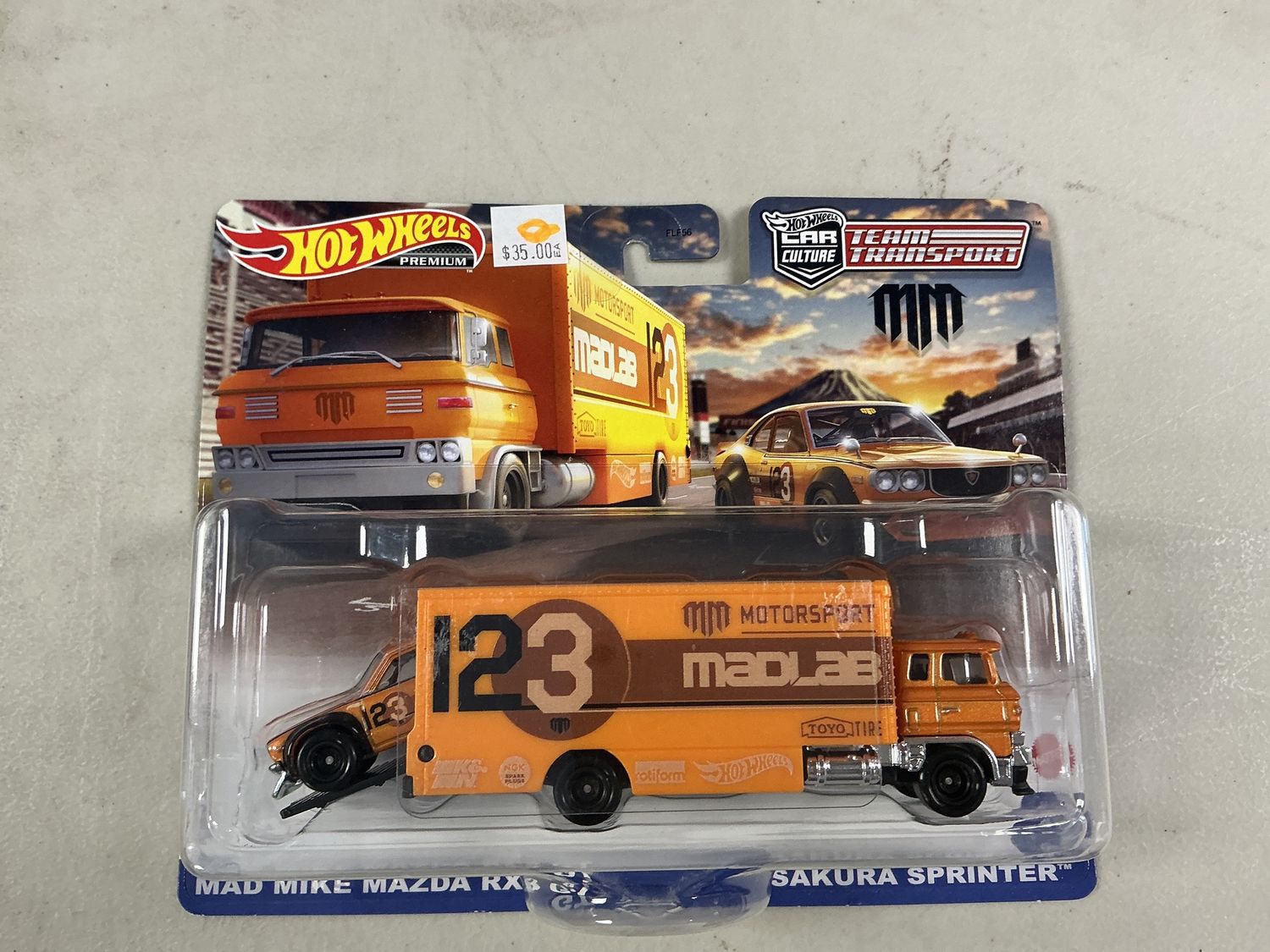 Team transport number 58 Mad Mike Mazda