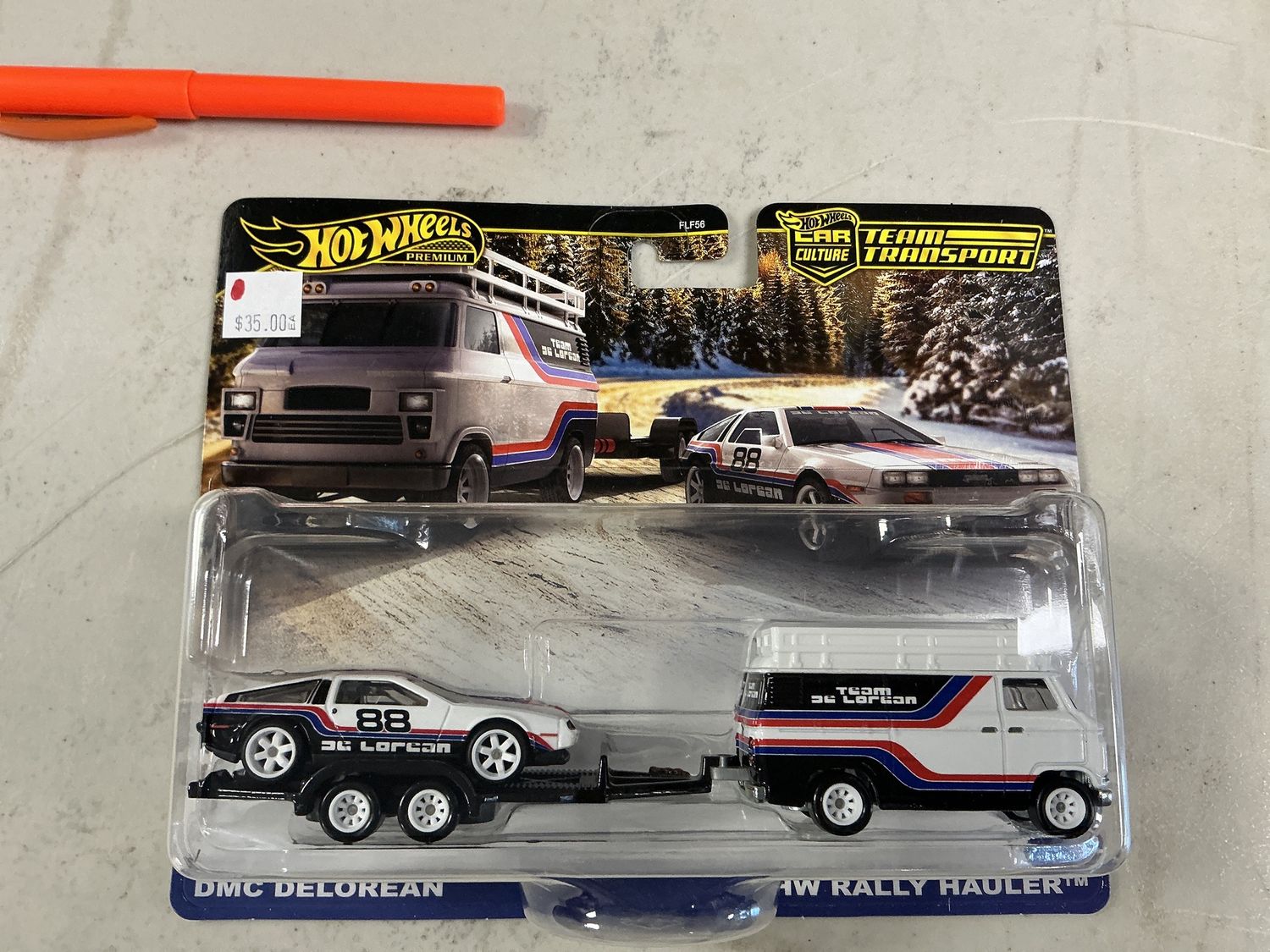 Team transport number 78DMC DeLorean with rally haulier