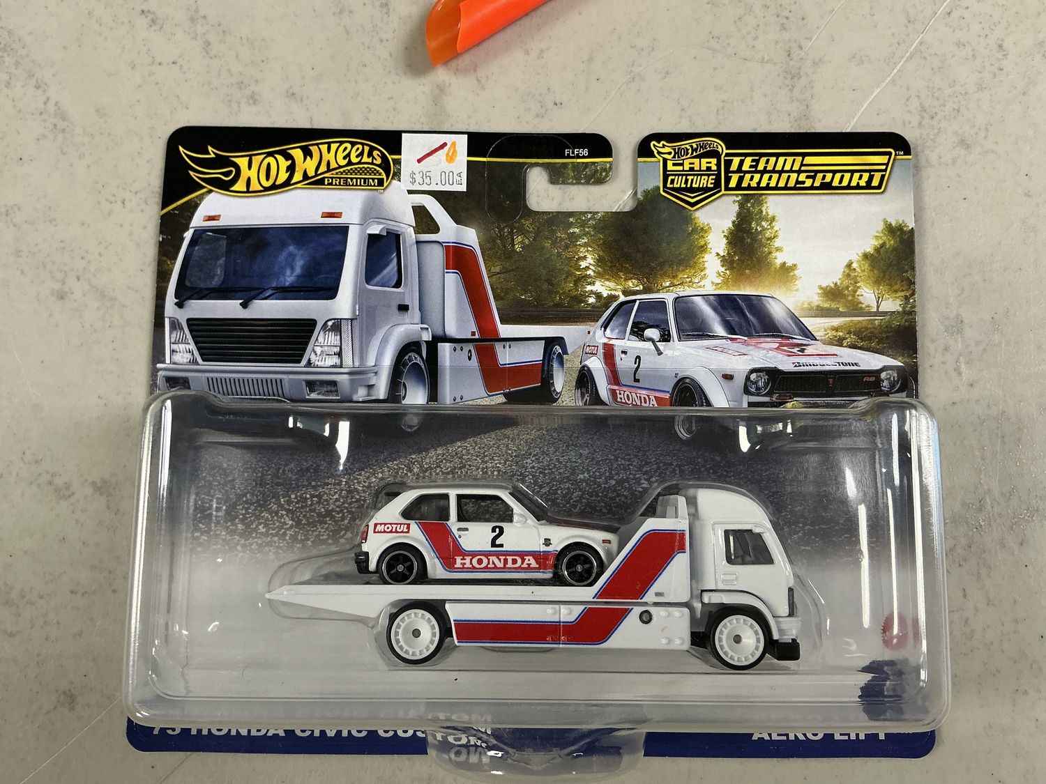Team transport number 80 1973 Honda Civic custom arrow lift