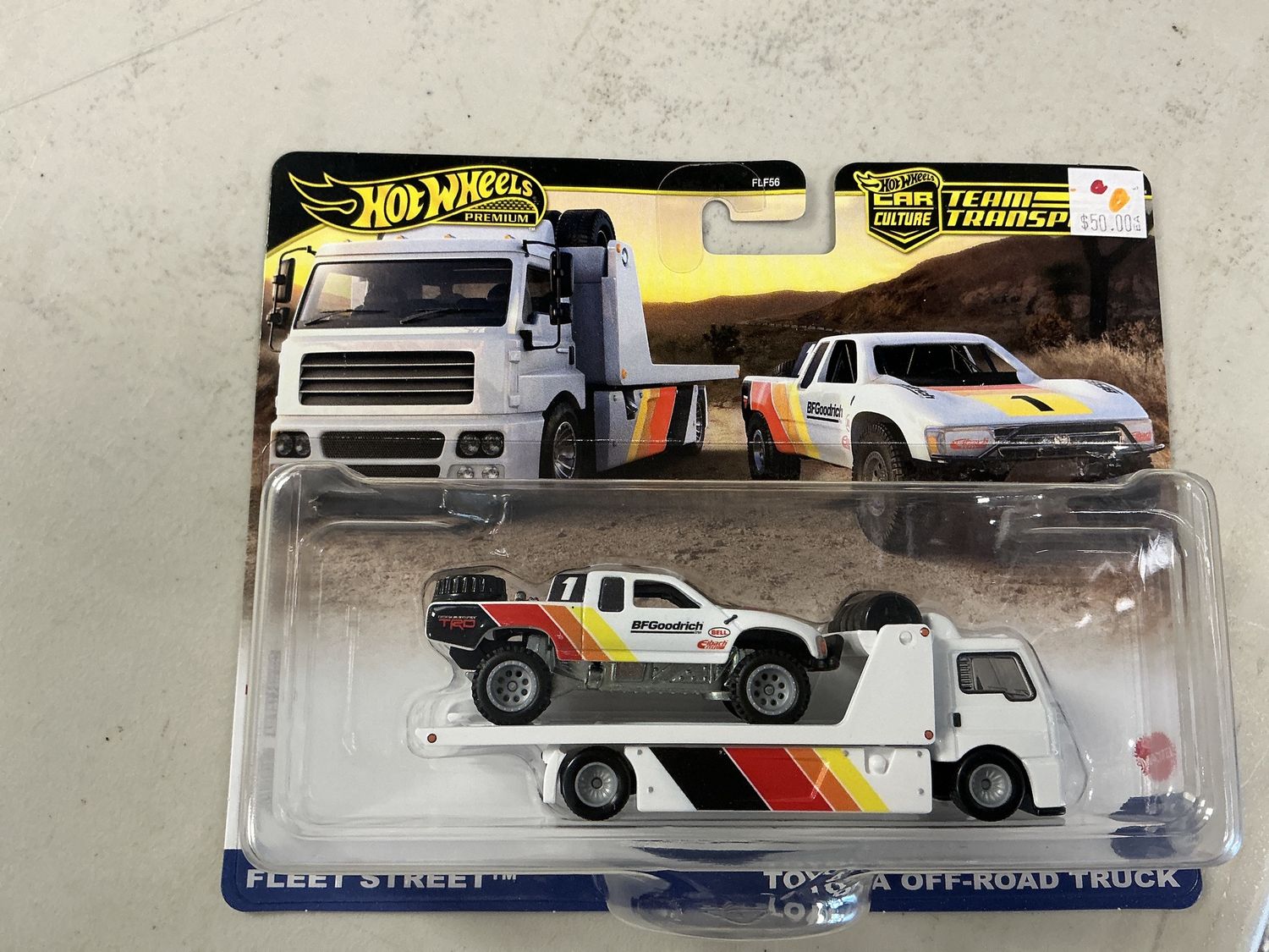 Team transport number 71 Fleet St., Toyota off-road truck