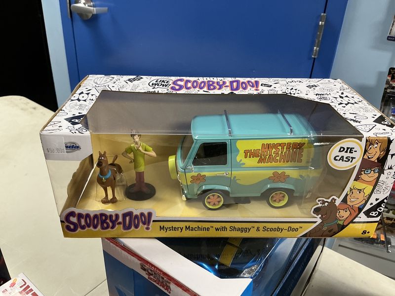 Mystery machine was shaggy and Scooby figurines