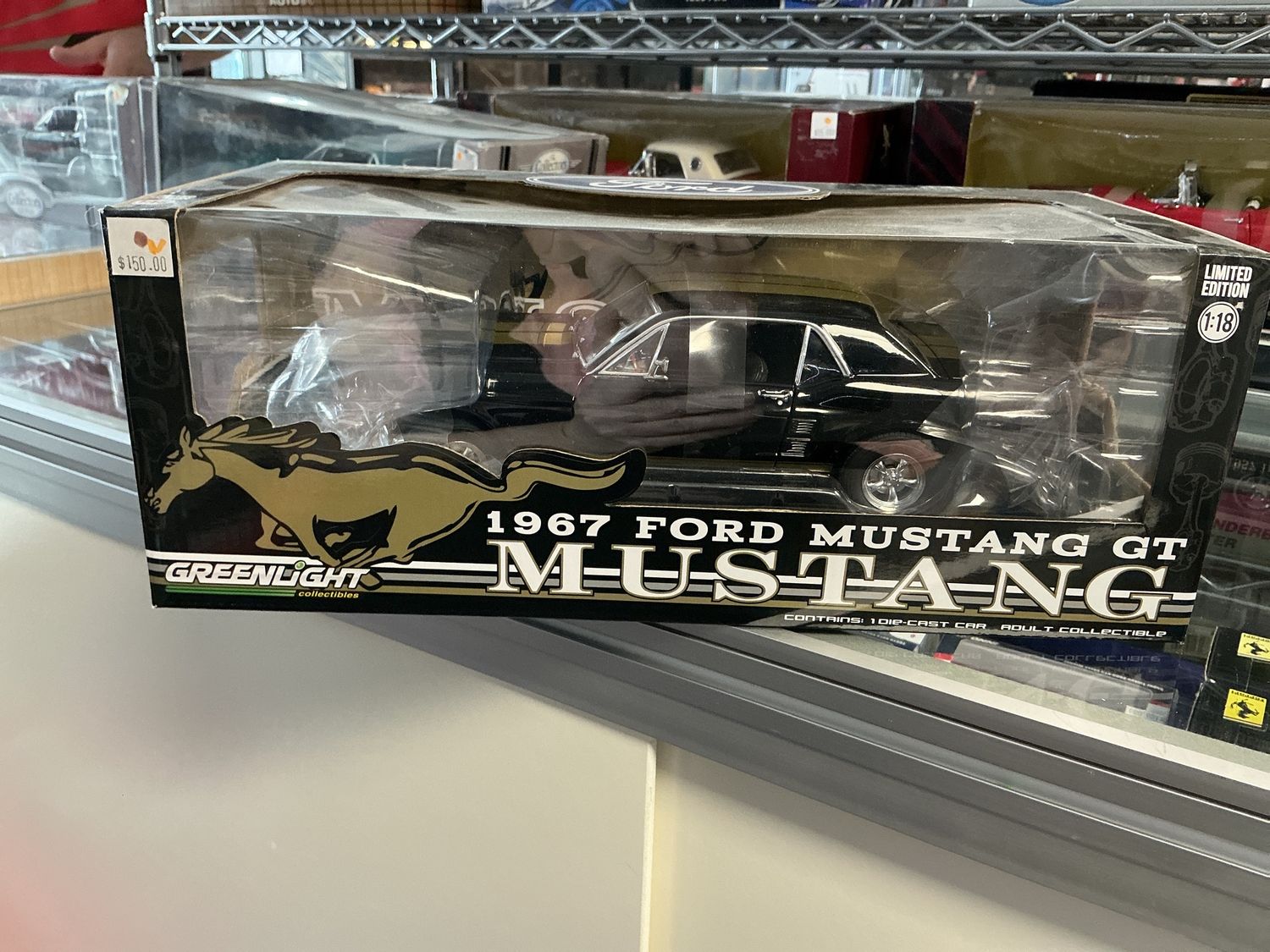 1967 Ford Mustang GT black with gold stripes
