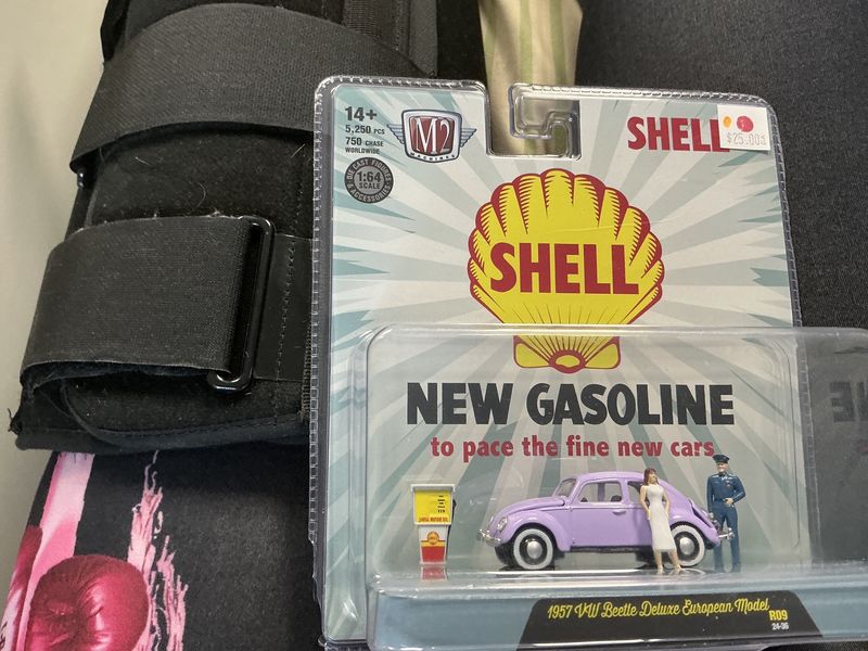 1957 VW beetle deluxe, European model purple shell with figures