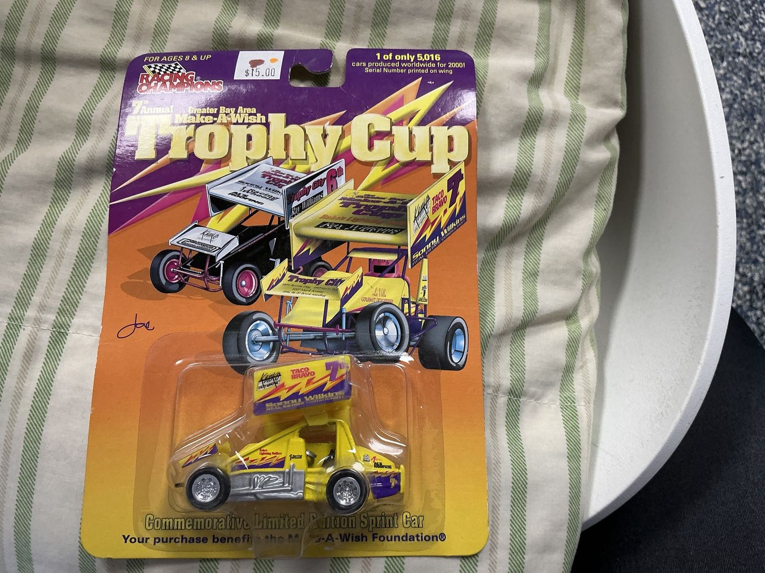 Trophy cup number seven yellow sprint car