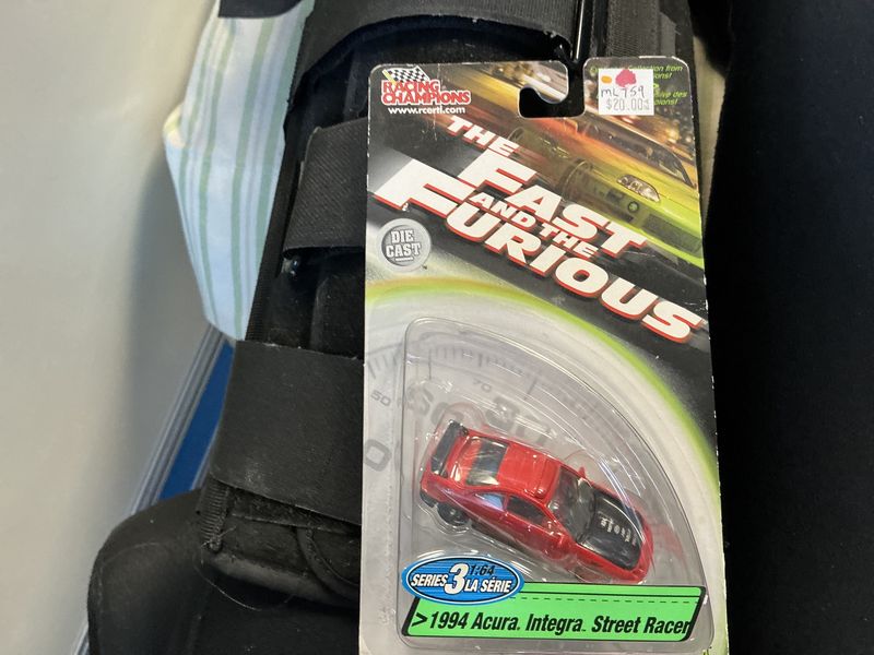 The fast and furious 1994 Acura integra  racer red