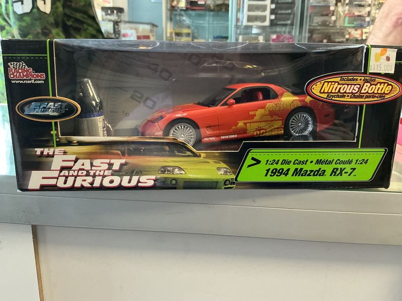 The fast and the furious 1994 Mazda RX seven orange