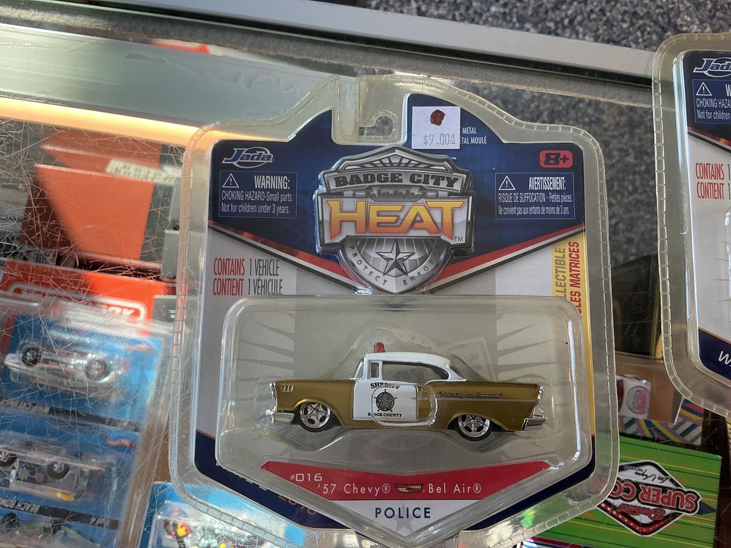 1957 Chevy Bel-Air, gold police badge city heat