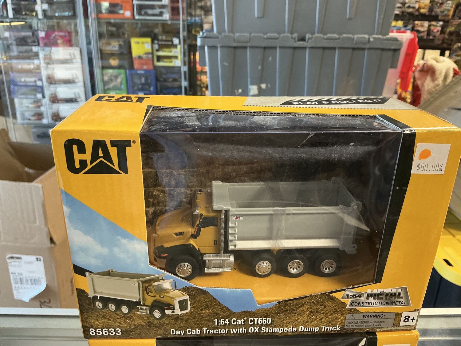 Cat CT 660 day cab tractor with OX stampede dump truck