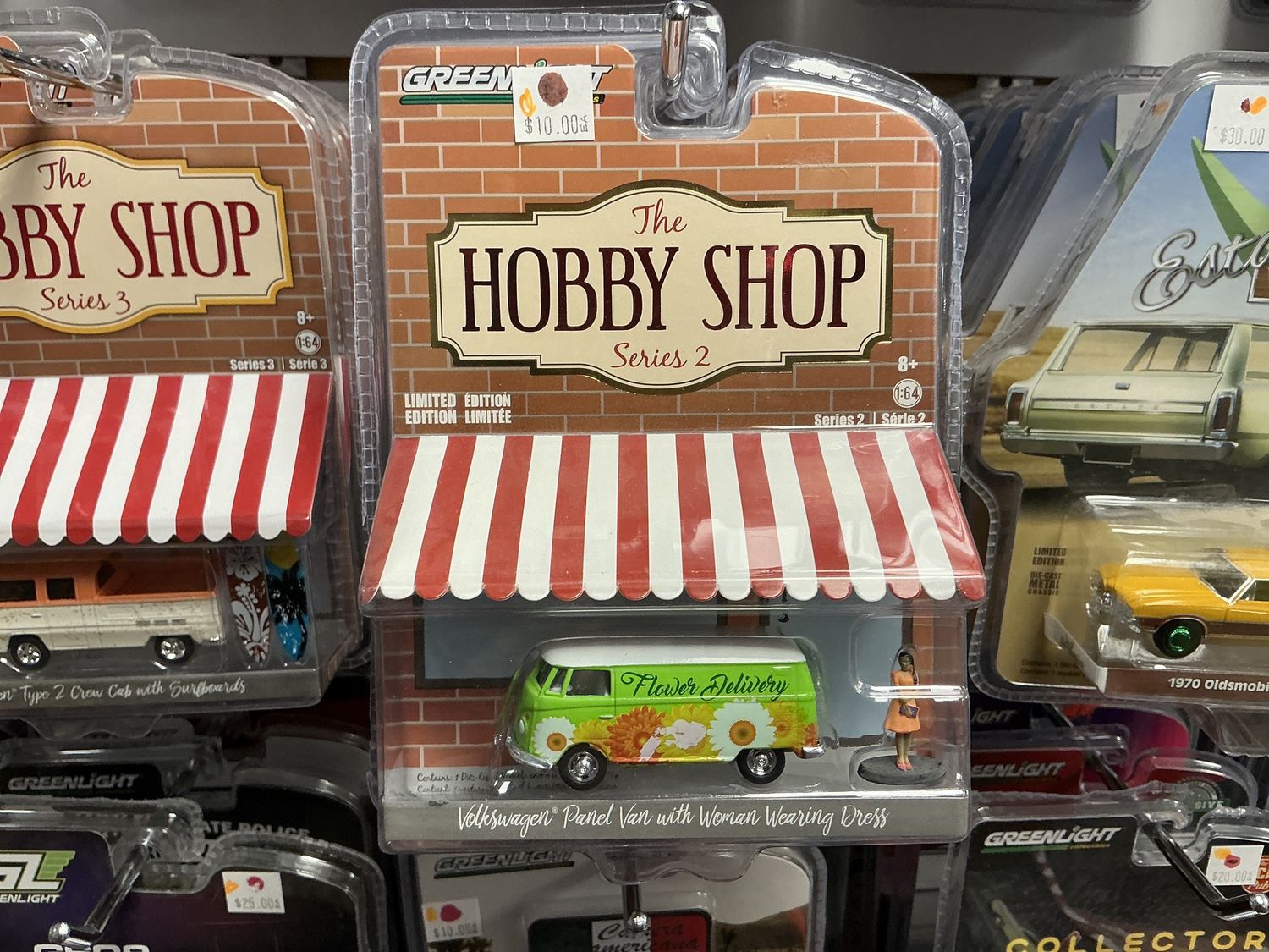 Volkswagen panel van with woman wearing dress