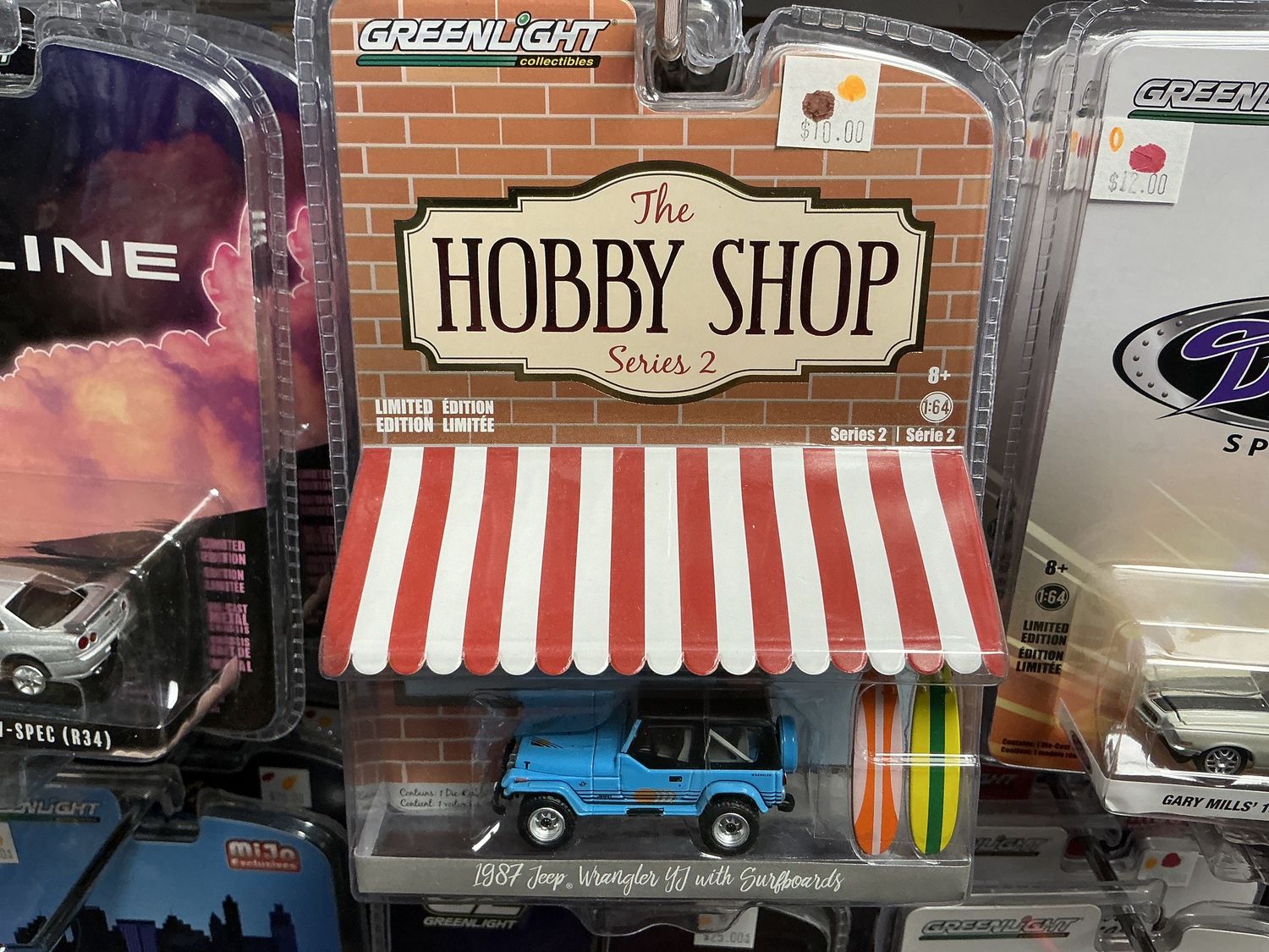 1987 Jeep Wrangler YJ with surfboards