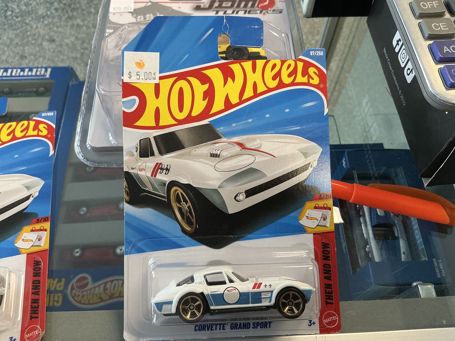 Corvette grand sport, white, and blue