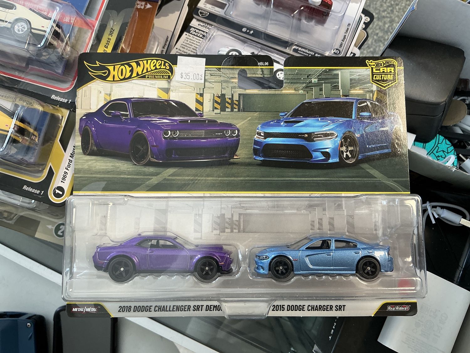 2018 Dodge Challenger SRT demon purple with a 2015 Dodge charger SRT blue