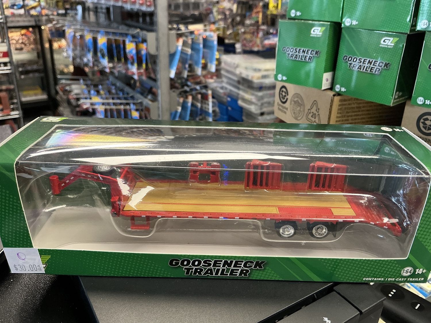 Red gooseneck trailer