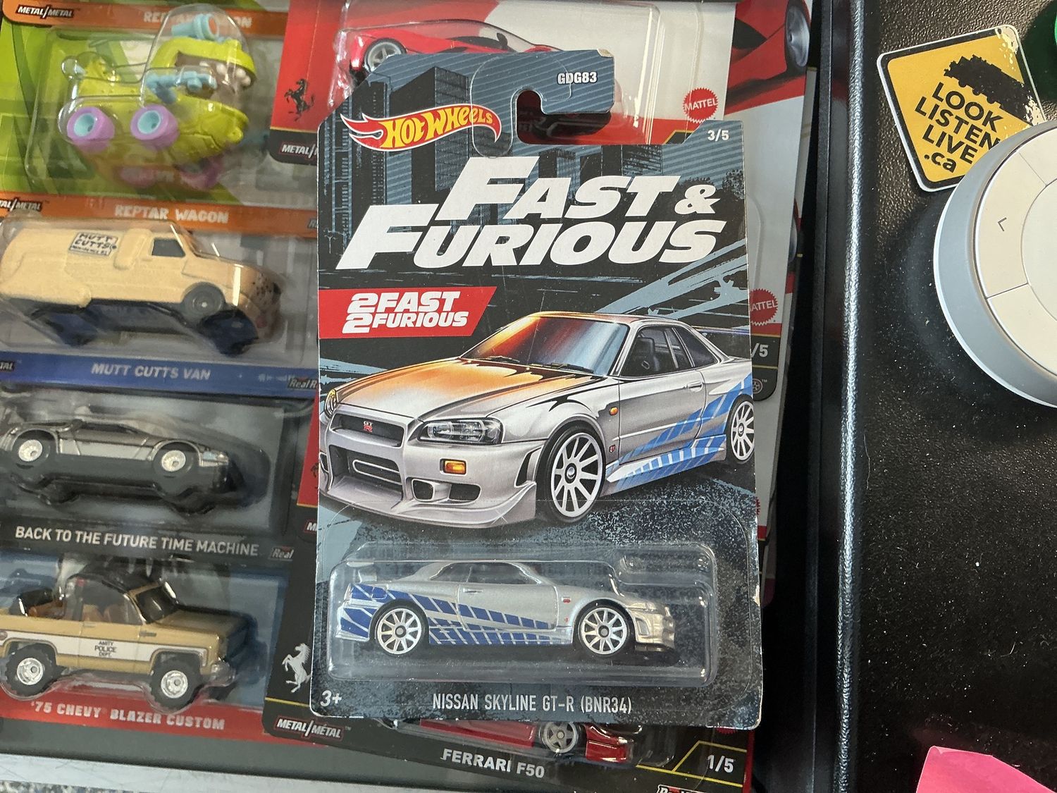 Two fast, two furious Nissan skyline GTR, silver, and blue