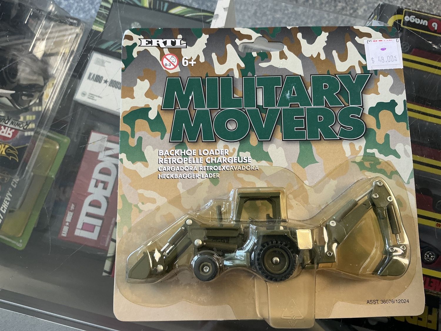 Military movers, backhoe loader