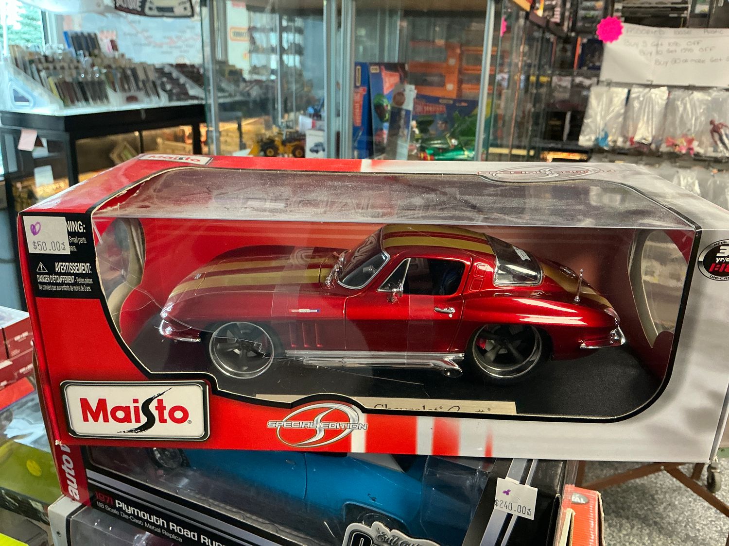 1965 Chevy Corvette red with gold stripes