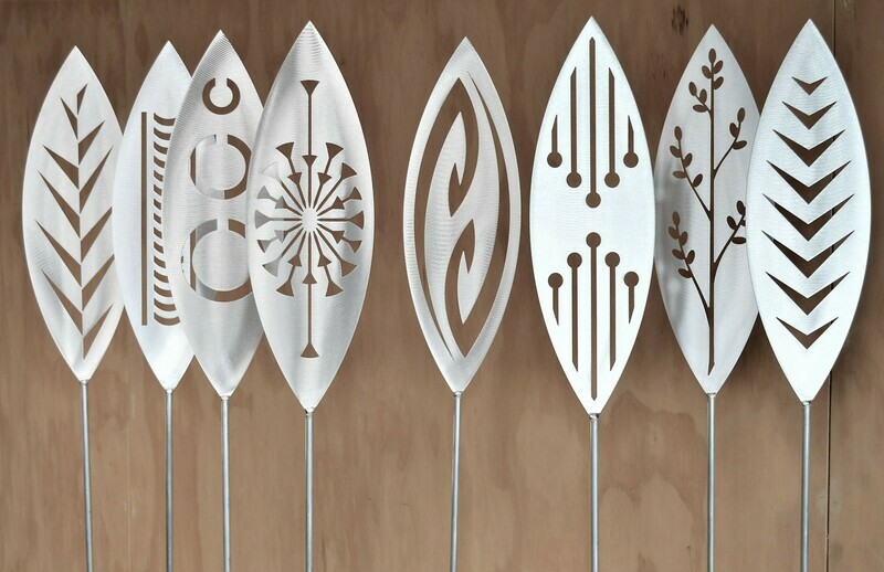 Gallery line up for Aluminium Spears by Grounded Art NZ. The designs are Nikau, Tribal, Tohu, Fish Hook, Reflection, Korokio.